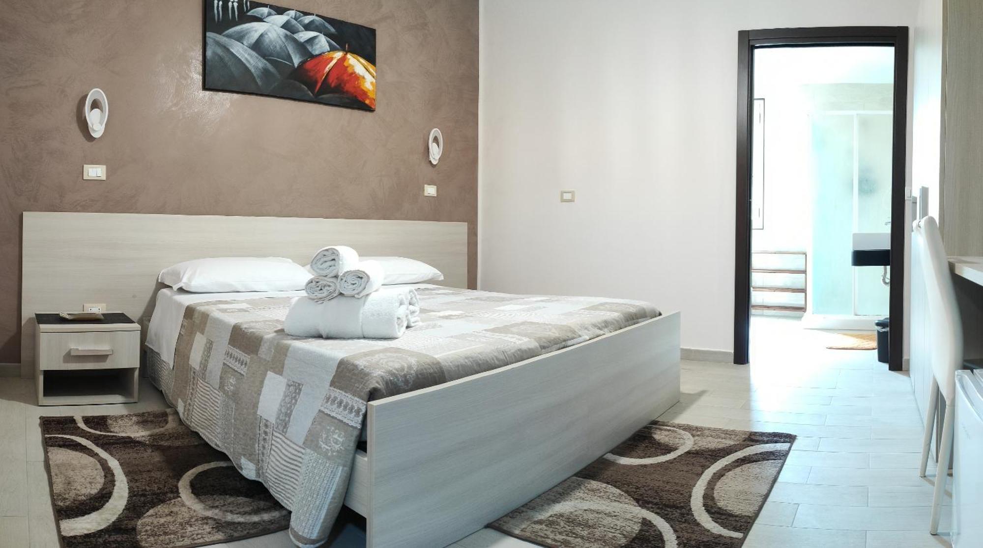 Camera Matrimoniale/Doppia con Letti Singoli con Bagno Privato